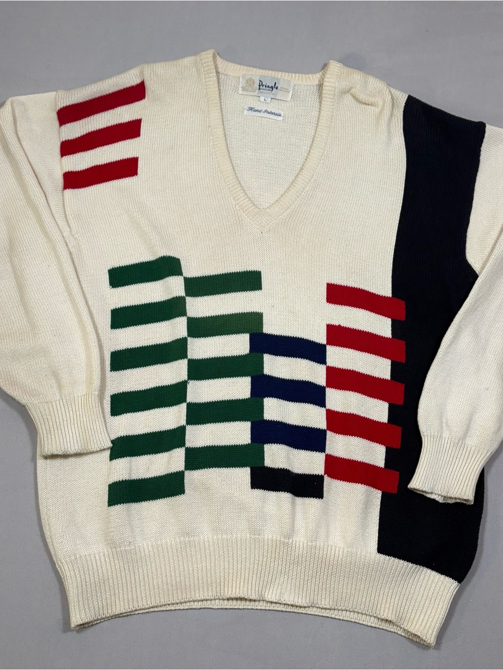 Pringle Cream V-Neck Sweater with Red, Green & Navy Graphic Stripes